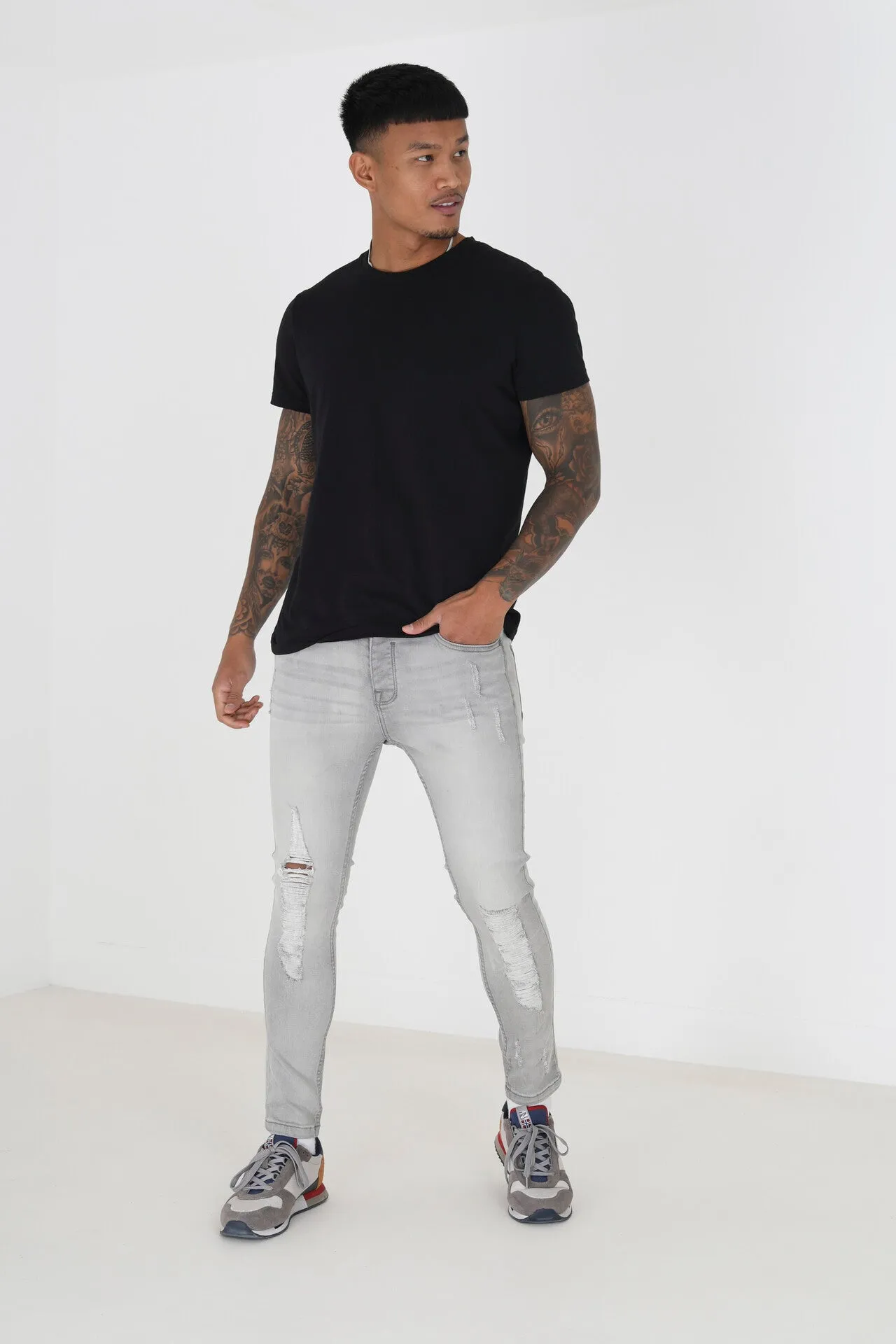 DARK GREY WASH SKINNY RIPPED JEANS