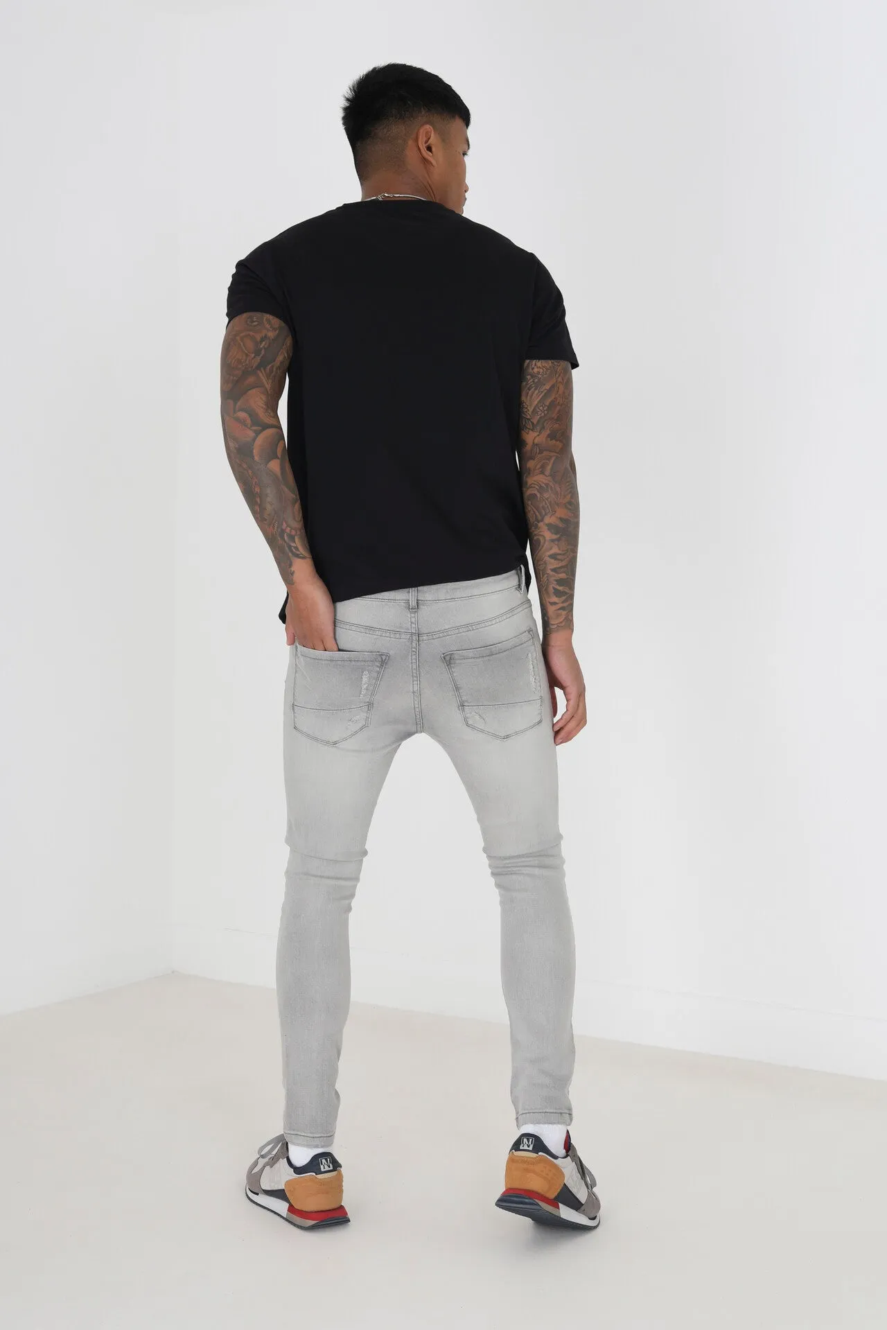 DARK GREY WASH SKINNY RIPPED JEANS